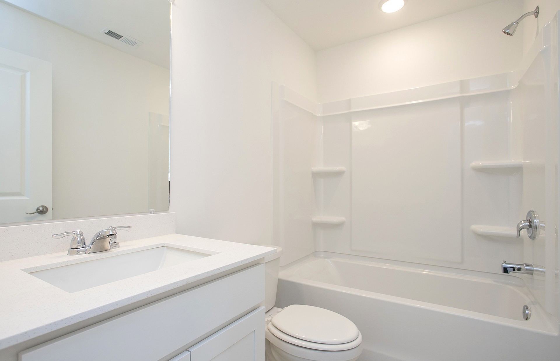 7116 Mapleside Lane Fairview, TN 37062 - Photo 18 of 49 a bathroom with a granite countertop sink a toilet and bathtub