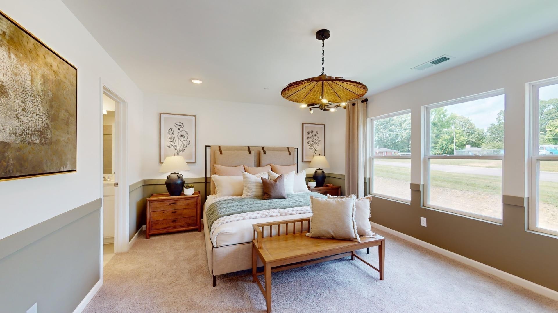 7116 Mapleside Lane Fairview, TN 37062 - Photo 28 of 49 a bedroom with furniture and a chandelier