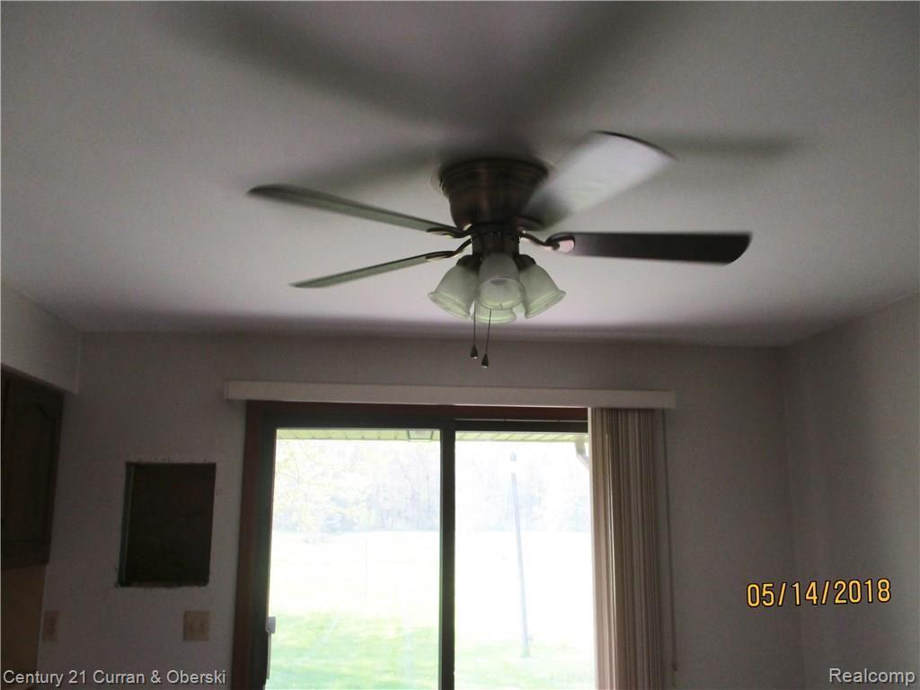 18480 Merriman Road Romulus, MI 48174 - Photo 13 of 30 CEILING FAN - REMOVED WALL AC UNIT TO THE LEFT