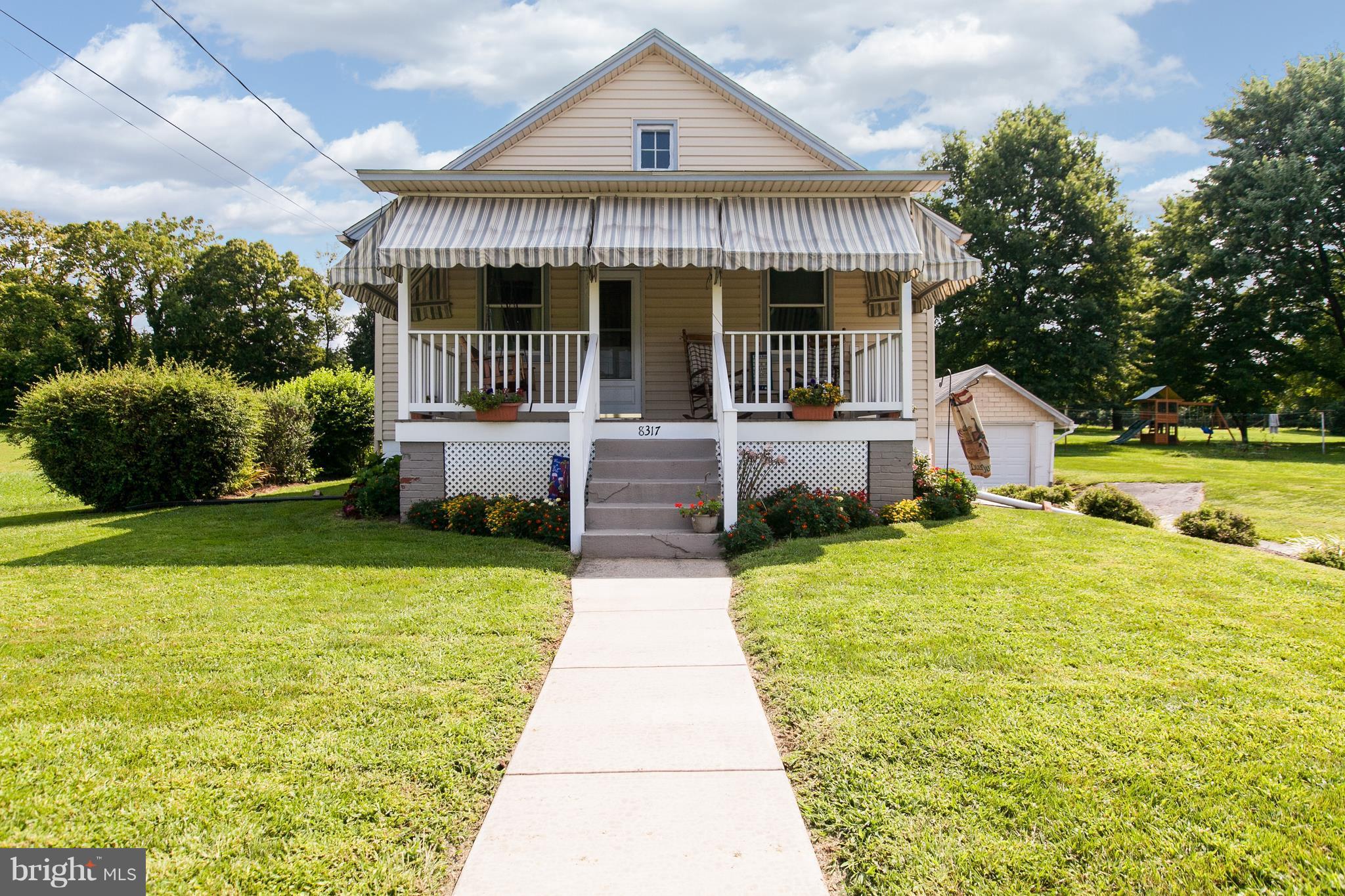 8317 Myersville Road Middletown, MD 21769 - Photo 2 of 30 a front view of house with yard and green space