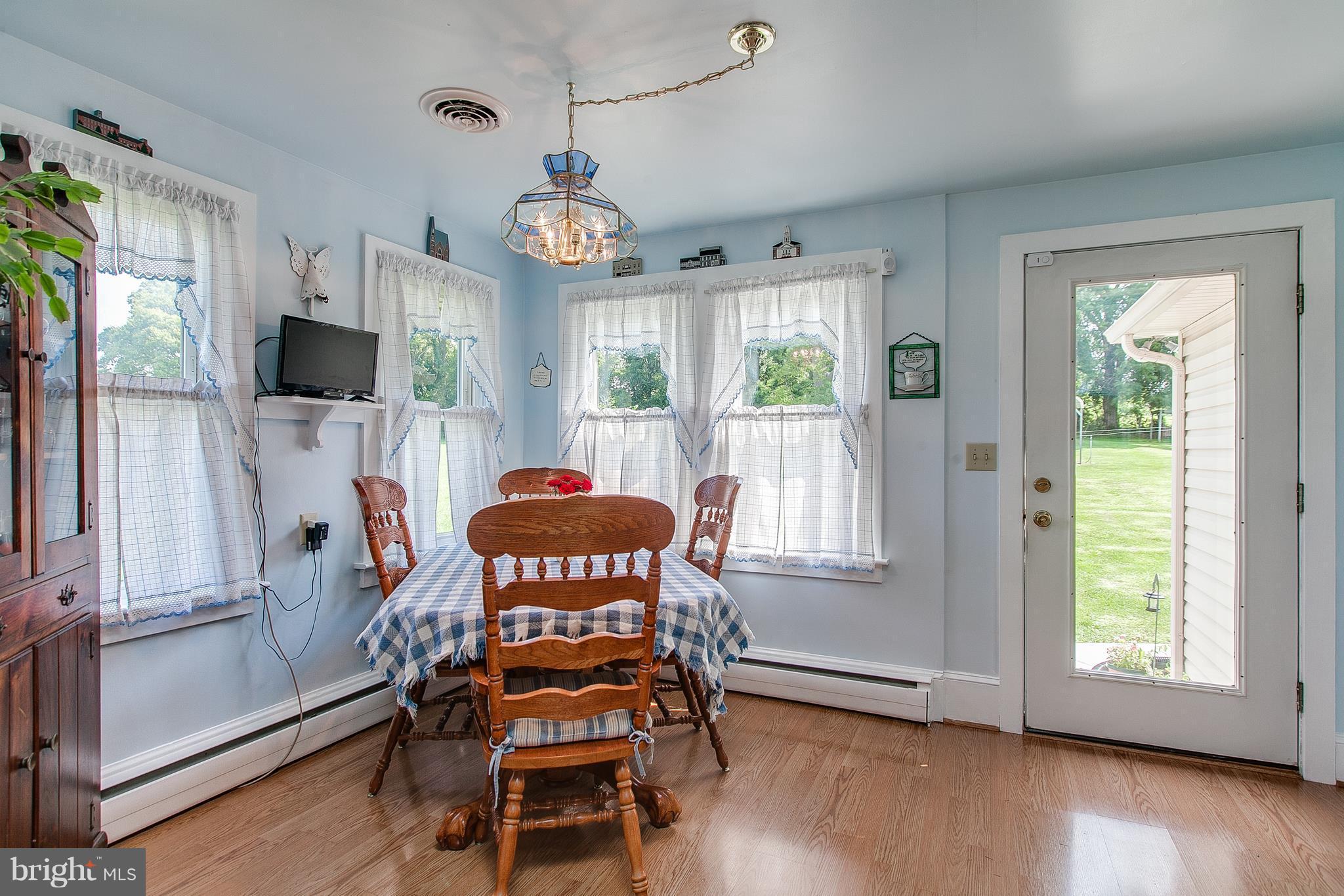 8317 Myersville Road Middletown, MD 21769 - Photo 18 of 30 a view of a livingroom with furniture window and wooden floor