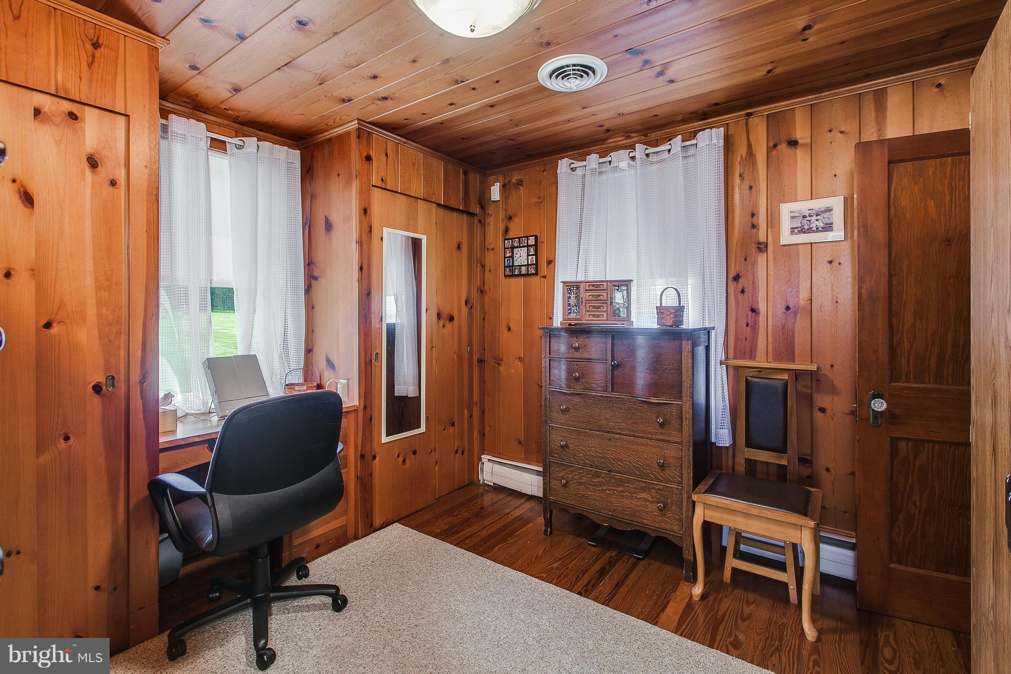 8317 Myersville Road Middletown, MD 21769 - Photo 21 of 30 a bedroom with furniture and a window