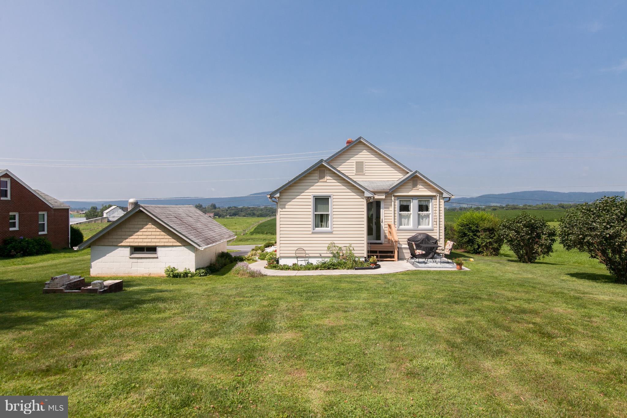 8317 Myersville Road Middletown, MD 21769 - Photo 25 of 30 a house view with a sitting space and garden