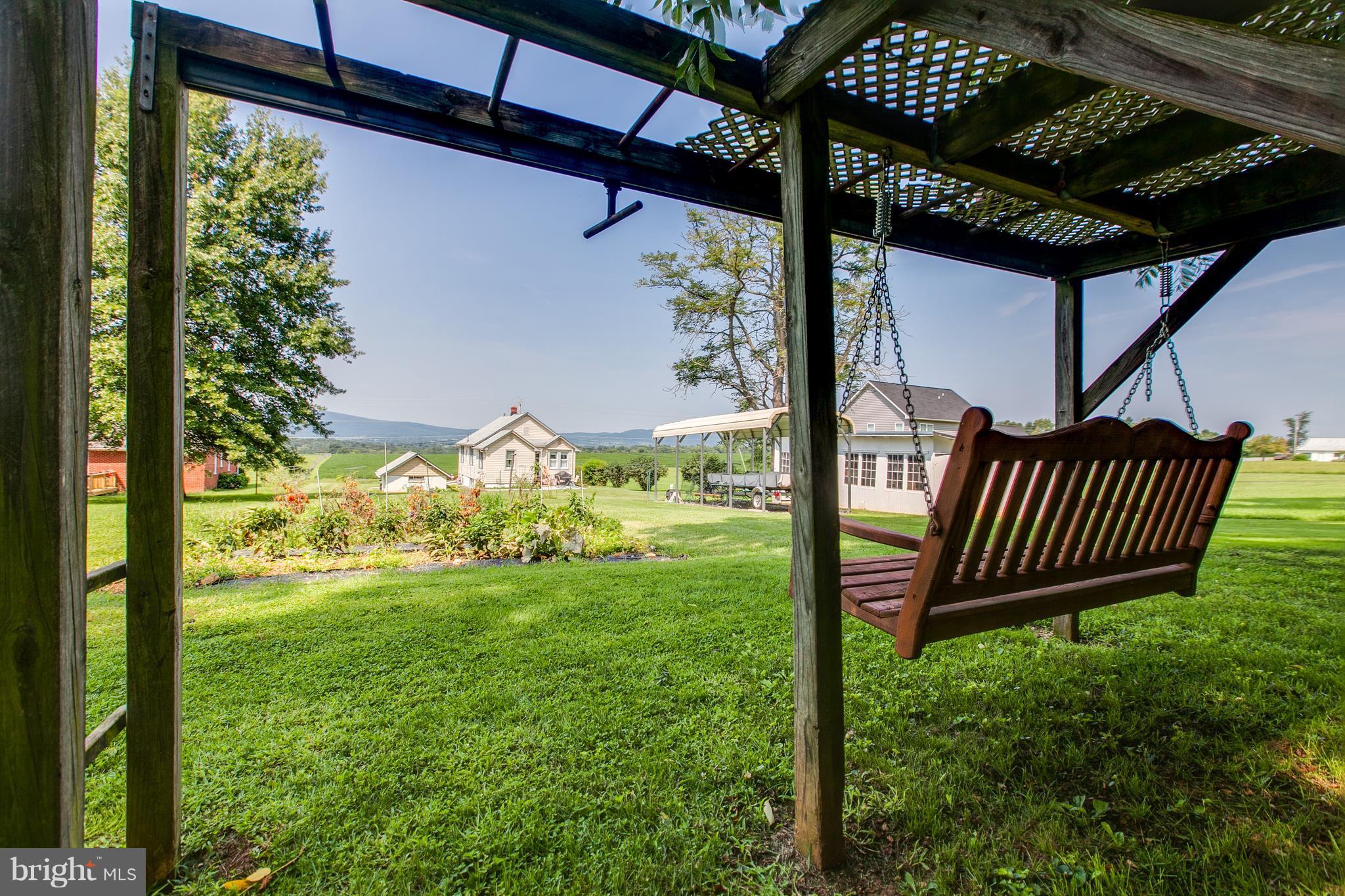 8317 Myersville Road Middletown, MD 21769 - Photo 28 of 30 a view of a backyard with garden