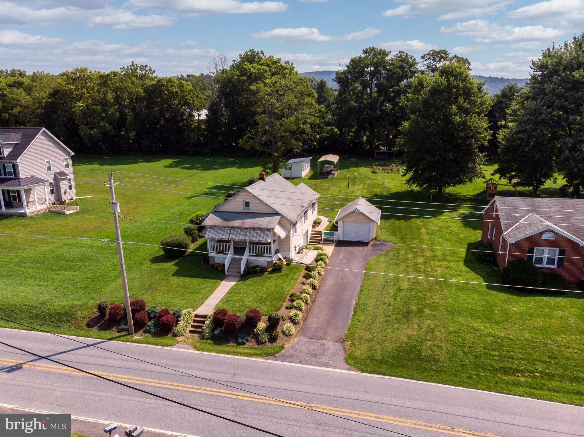 8317 Myersville Road Middletown, MD 21769 - Photo 4 of 30 an aerial view of a house with yard swimming pool and outdoor seating