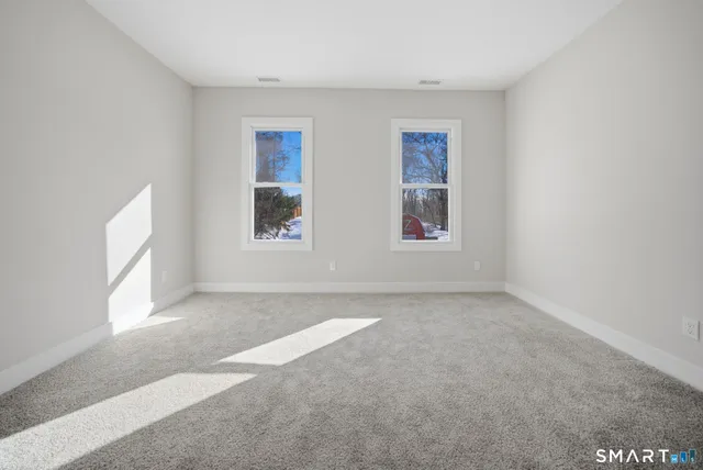 an empty room with windows