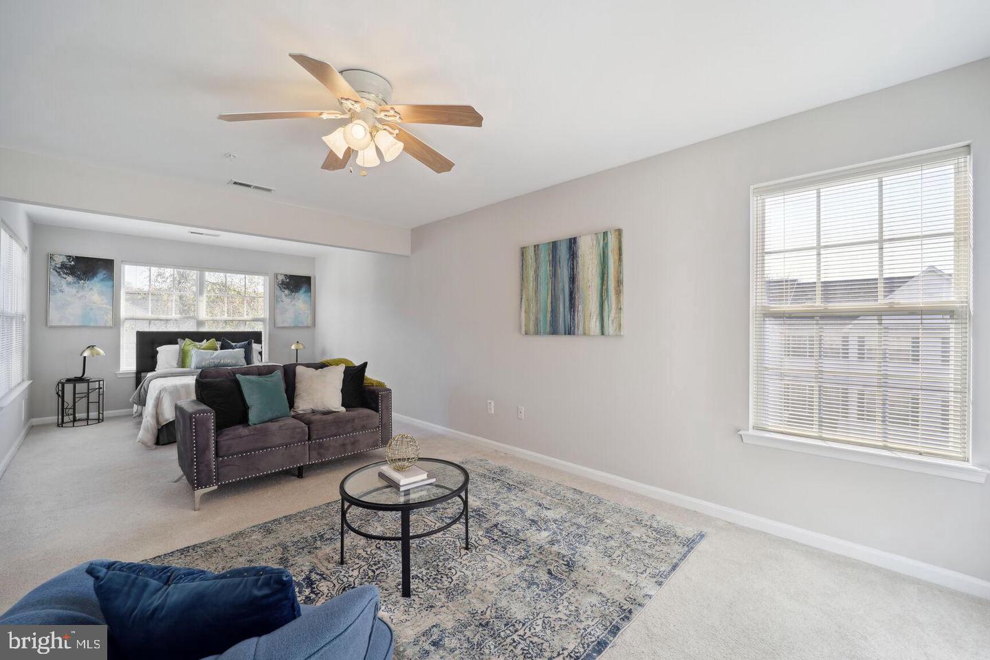 1116 Ring Bill Loop Upper Marlboro, MD 20774 - Photo 19 of 42 a living room with furniture and a large window