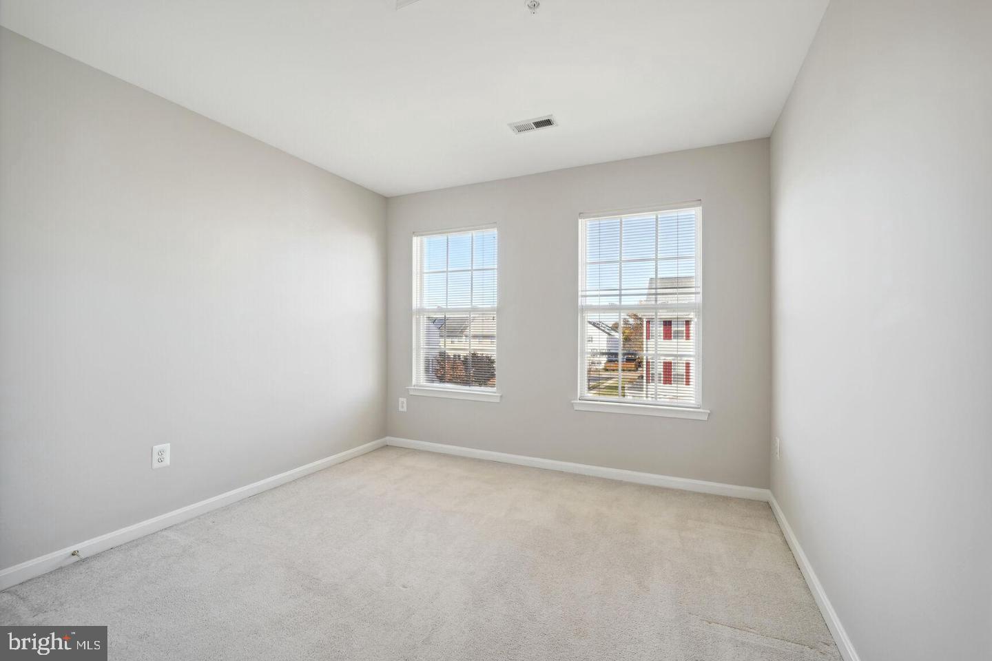 1116 Ring Bill Loop Upper Marlboro, MD 20774 - Photo 29 of 42 an empty room with windows