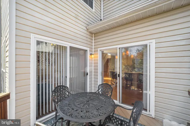 a view of a porch with furniture