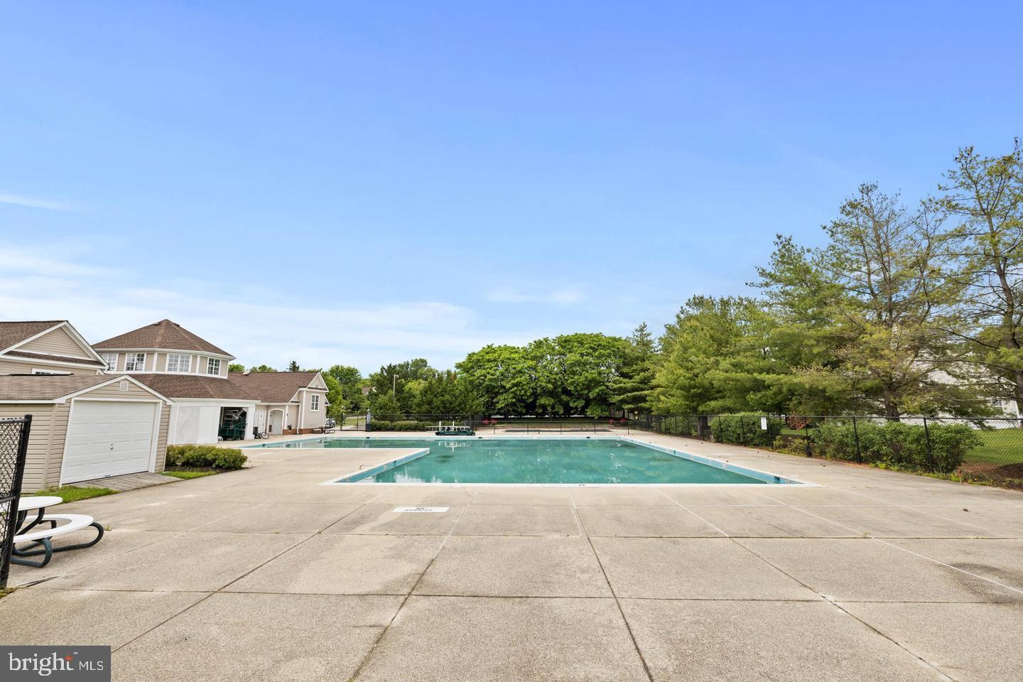 1116 Ring Bill Loop Upper Marlboro, MD 20774 - Photo 40 of 42 a view of a white house with a big yard and large trees