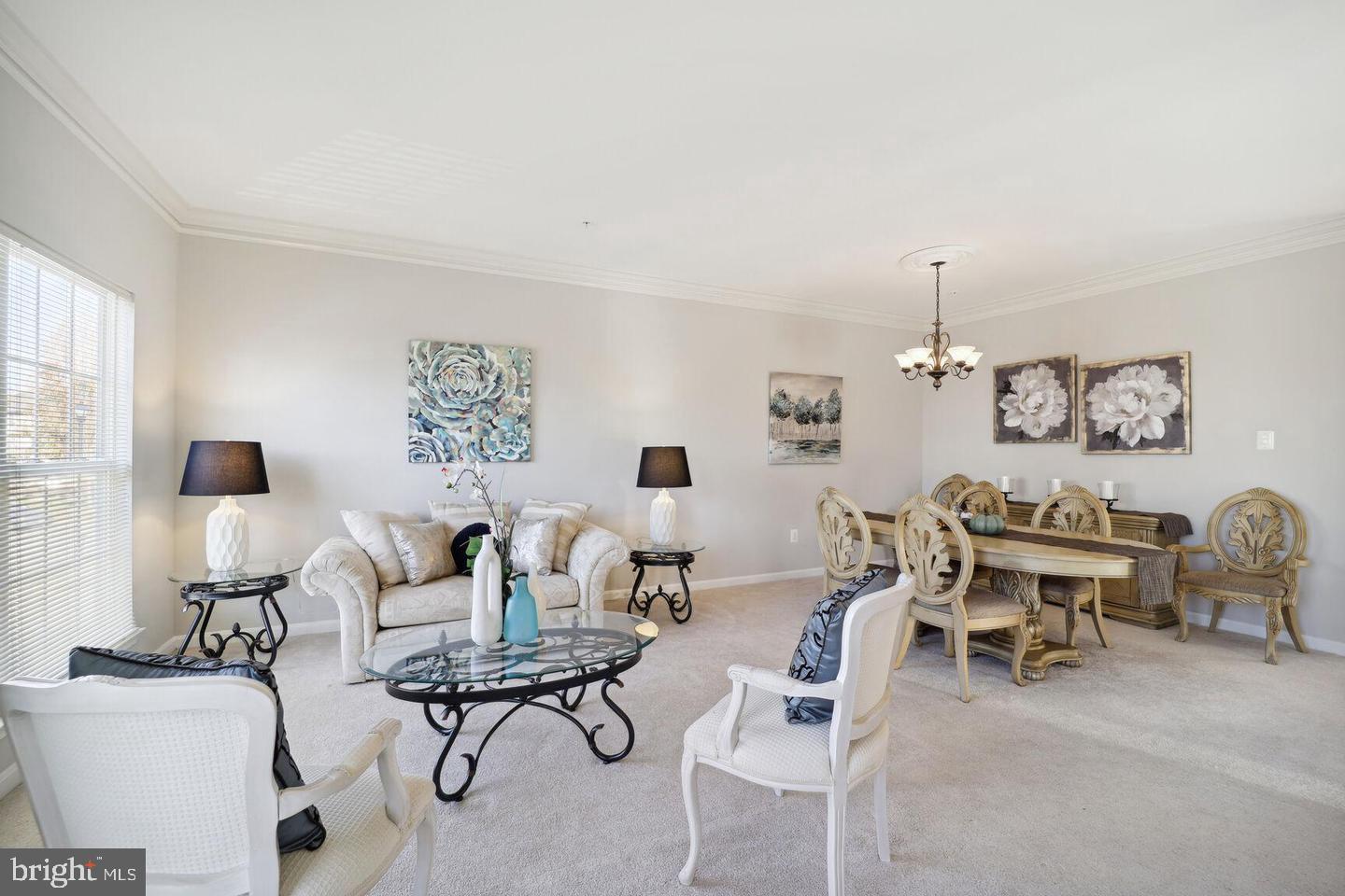 1116 Ring Bill Loop Upper Marlboro, MD 20774 - Photo 7 of 42 a living room with furniture and a table