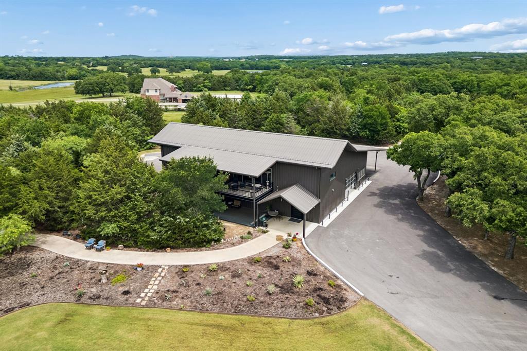 1306 Morrow Road Valley View, TX 76272 - Photo 39 of 40 an aerial view of a house with a yard and lake view