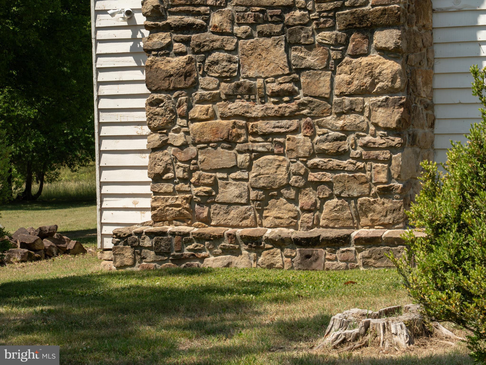 2345 Berry Hill Road Danville, VA 24541 - Photo 103 of 130 Stone Chimney at Original Kitchen