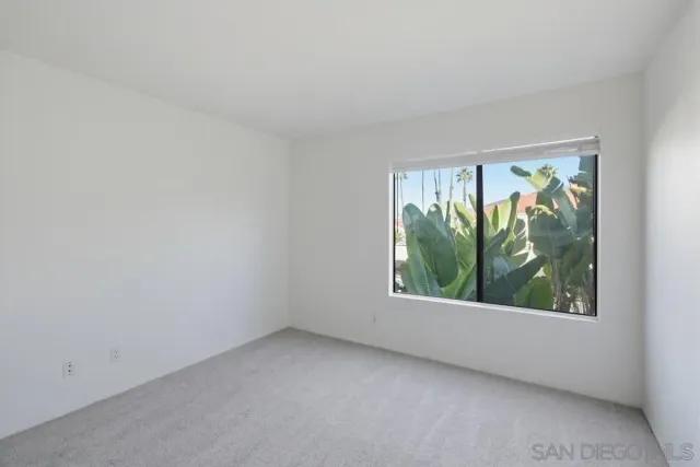 an empty room with window