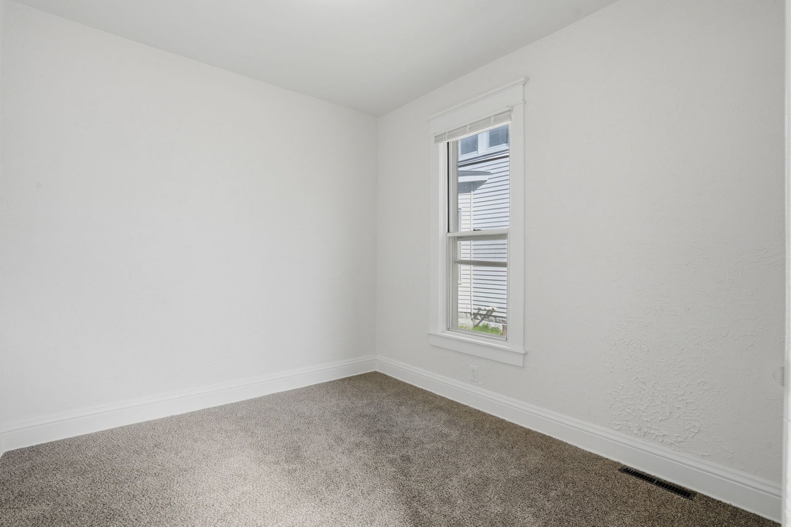1927 14th Street Moline, IL 61265 - Photo 12 of 25 an empty room with windows