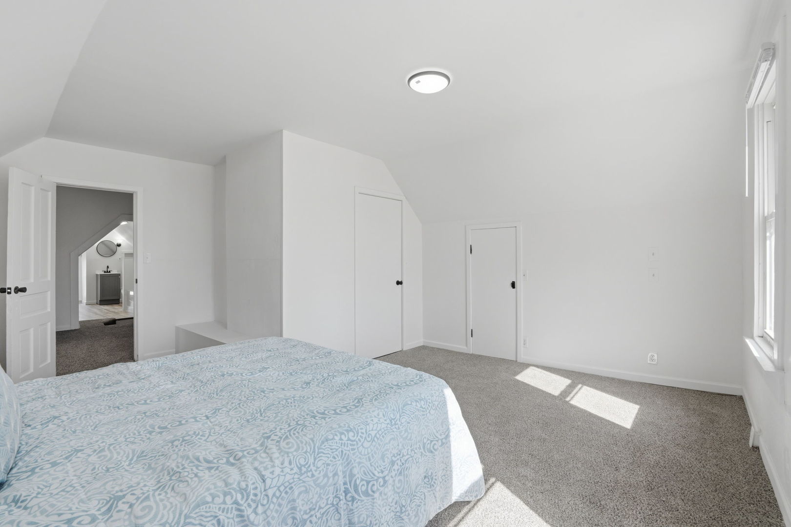 1927 14th Street Moline, IL 61265 - Photo 20 of 25 a bedroom with a bed and closet
