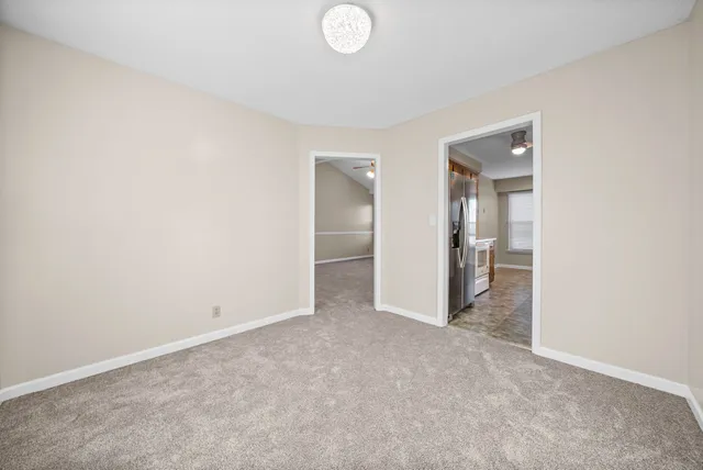 an empty room with a bathroom