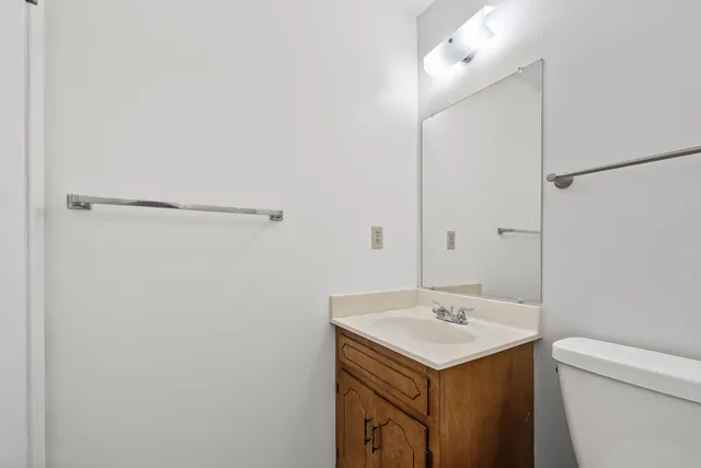 a bathroom with a sink and mirror