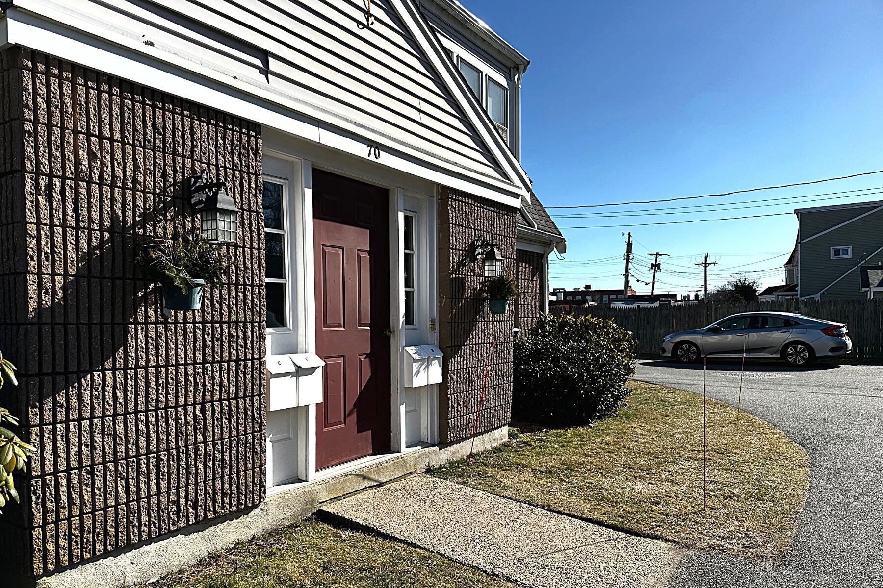 70 North Street, Unit E Hyannis, MA 02601 - Photo 2 of 29 a view of a entryway door front of house