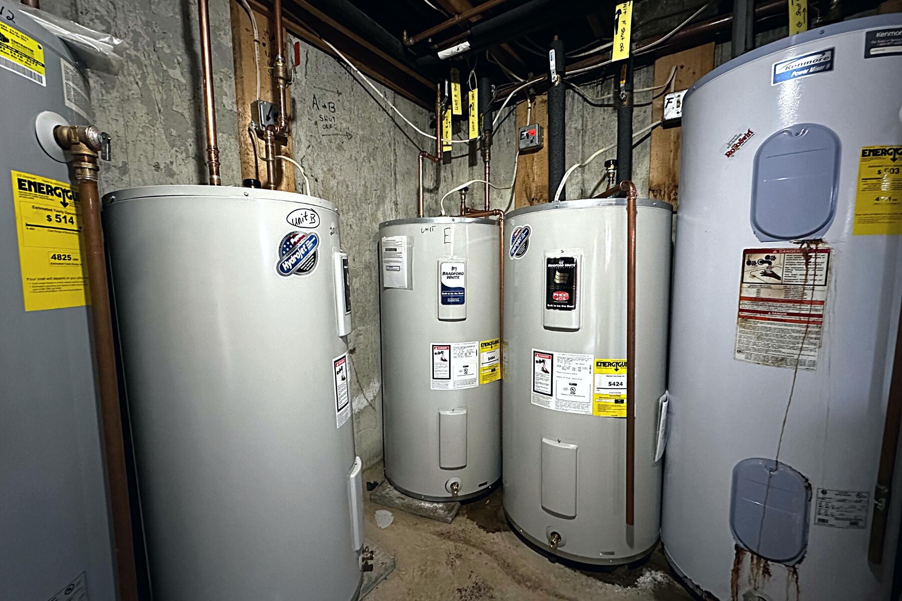 70 North Street, Unit E Hyannis, MA 02601 - Photo 22 of 29 a utility room with dryer and washer