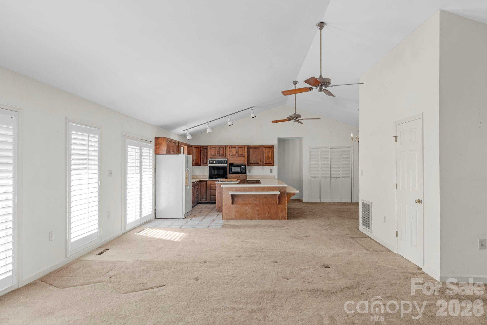 15015 Pawnee Trail Matthews, NC 28104 - Photo 12 of 39 a view of a kitchen with a sink and a window