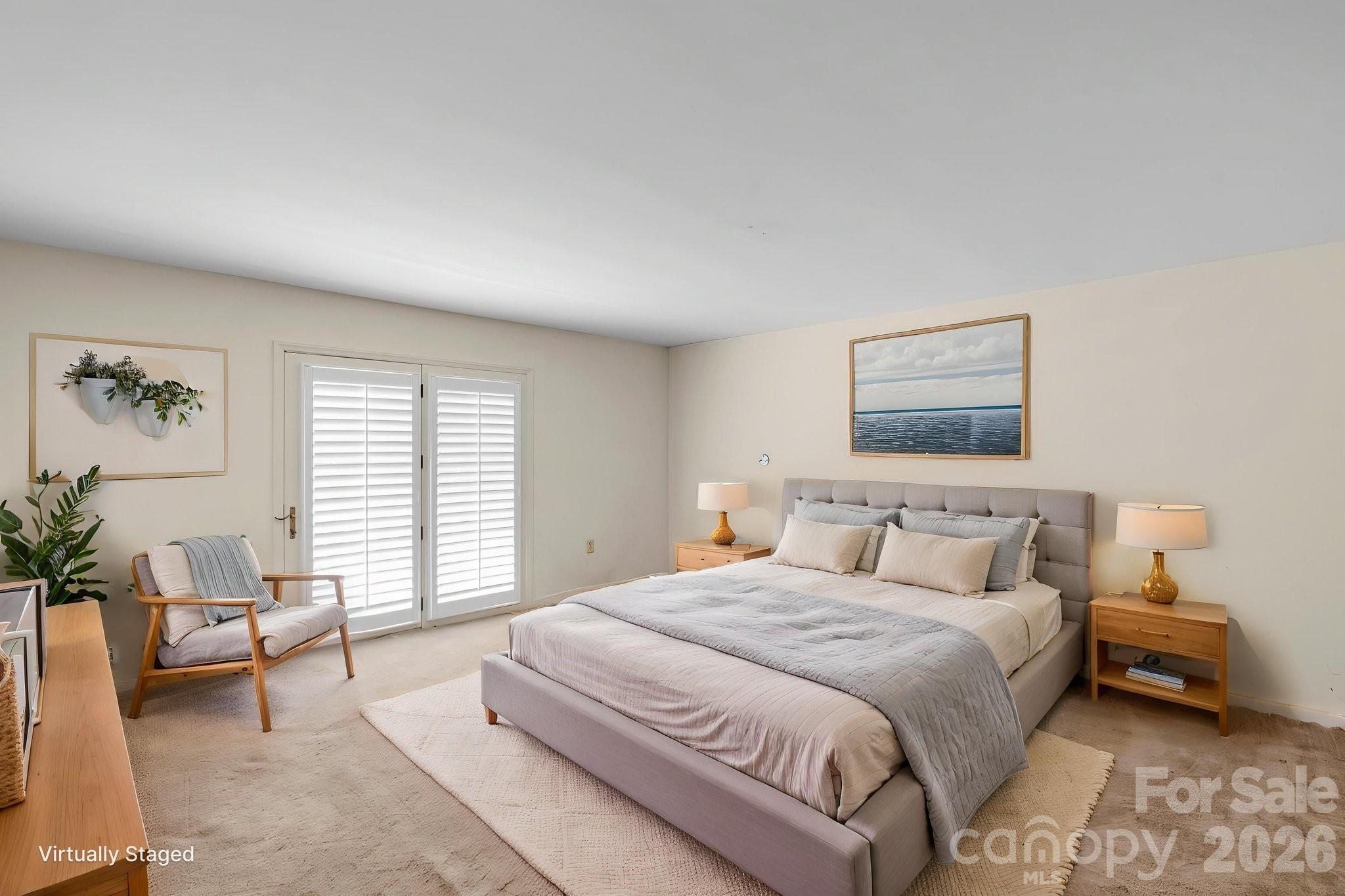15015 Pawnee Trail Matthews, NC 28104 - Photo 22 of 39 a bedroom with a bed and a couch