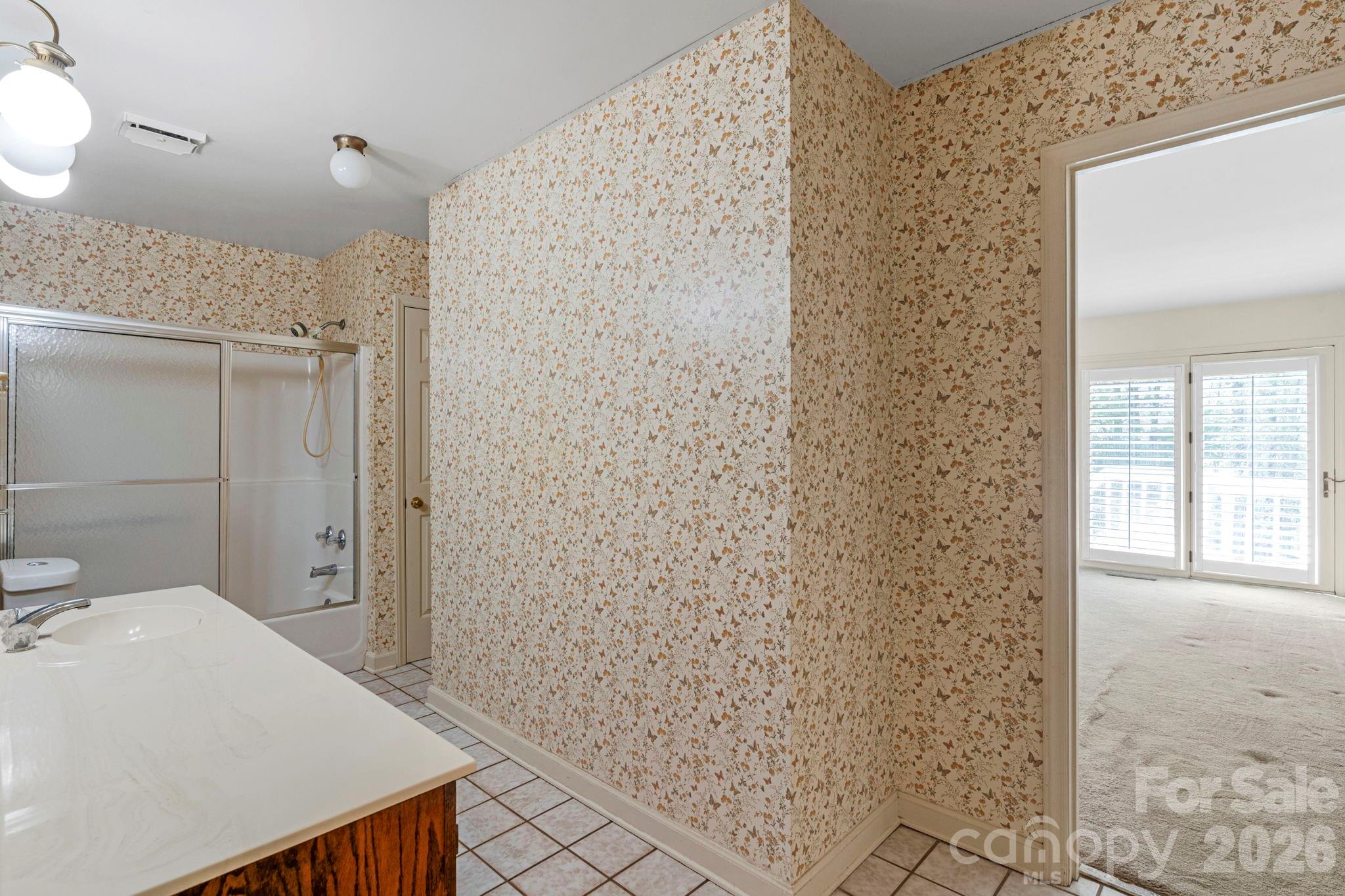 15015 Pawnee Trail Matthews, NC 28104 - Photo 25 of 39 a bathroom with a shower