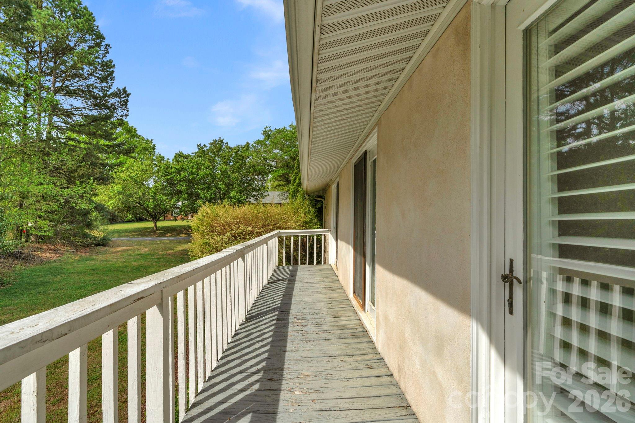 15015 Pawnee Trail Matthews, NC 28104 - Photo 38 of 39 a view of a balcony with wooden floor