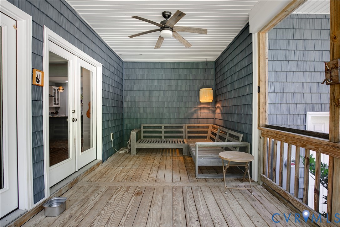 9749 Hoke Brady Road Henrico, VA 23231 - Photo 40 of 53 a view of a balcony with chairs and wooden floor