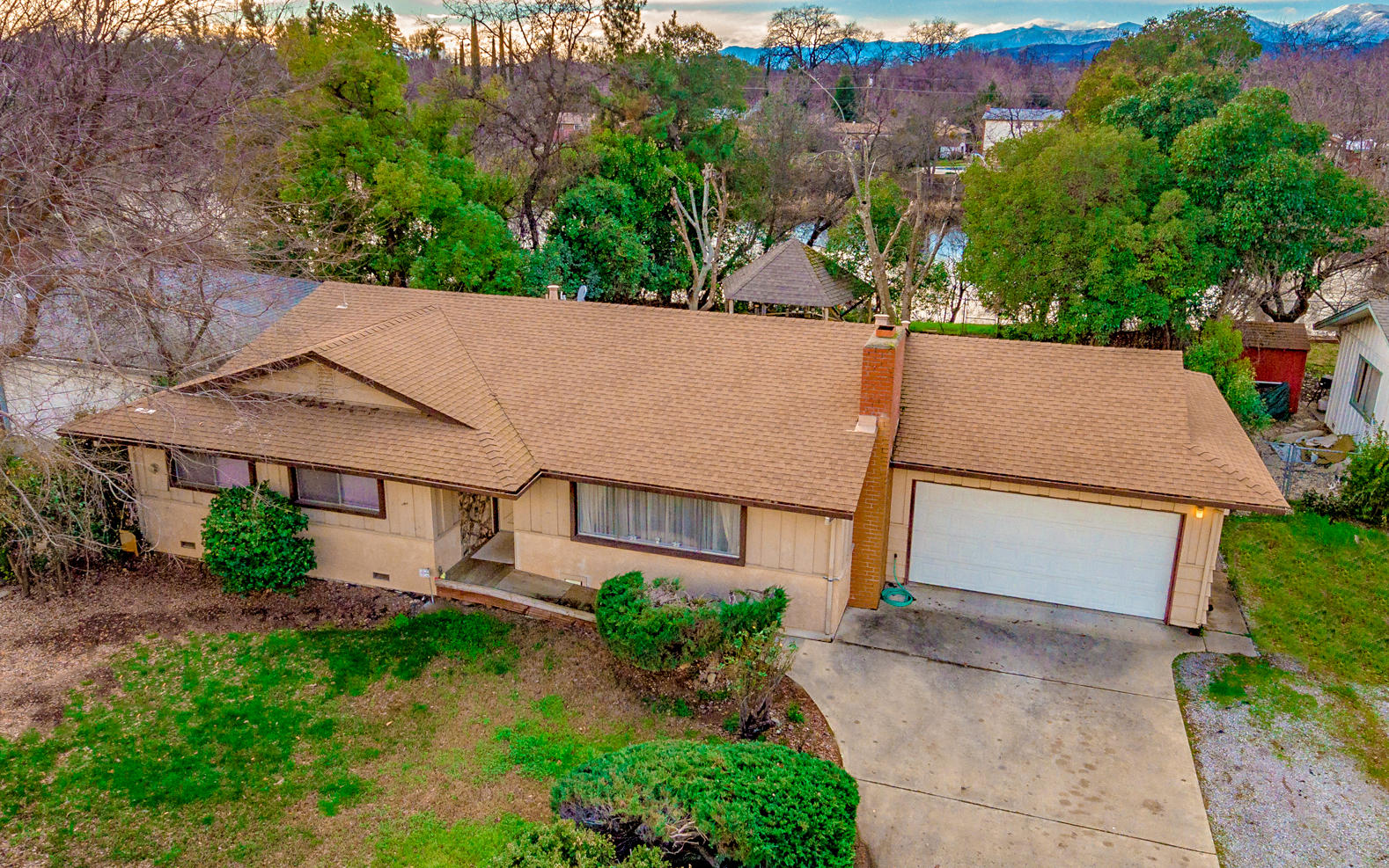 front view of a house with a yard