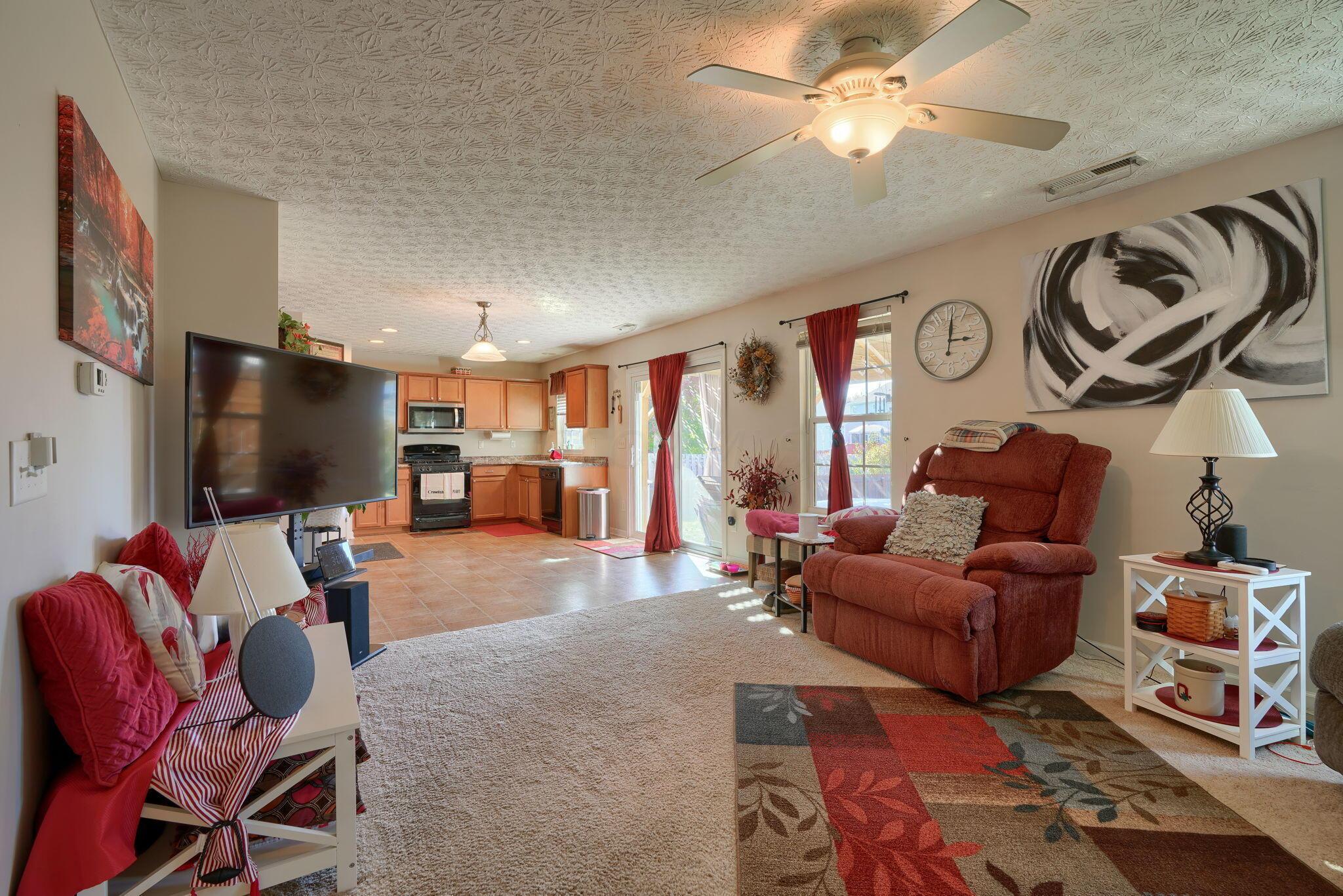 5747 Little Red Rover Street Groveport, OH 43125 - Photo 37 of 47 view from formal living room into dining and kitchen area
