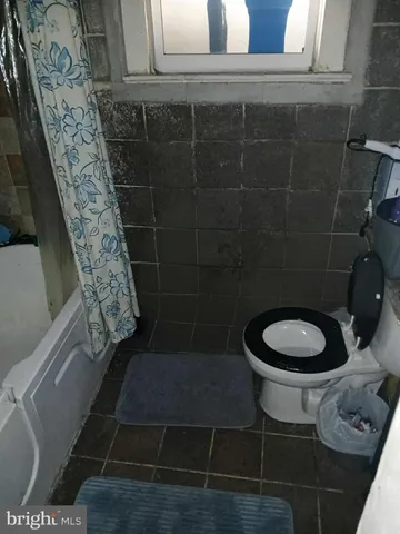 an empty room with wooden floor