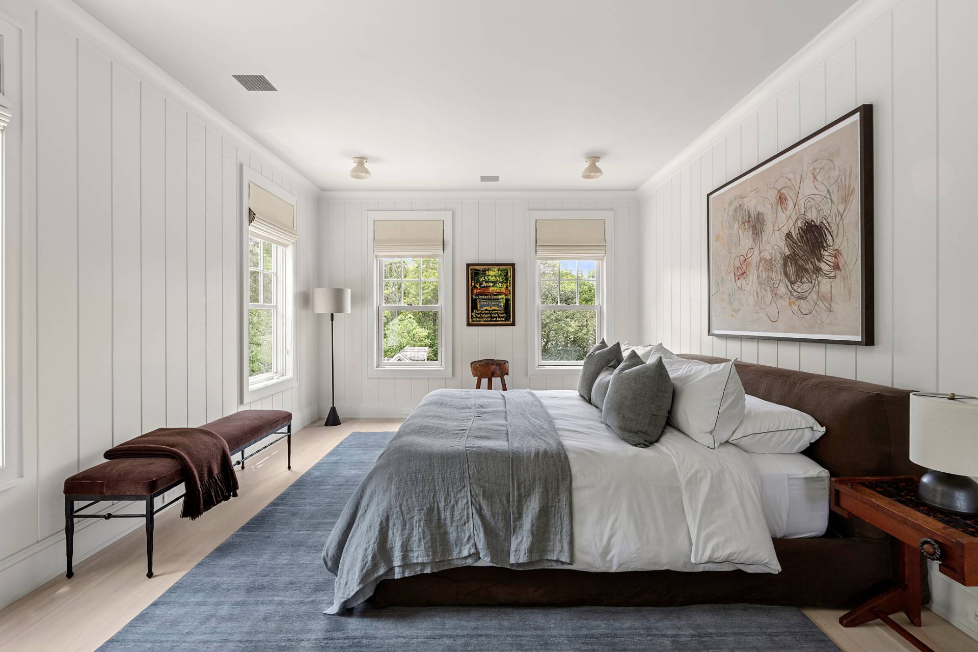 23 Wooded Path Sag Harbor, NY 11963 - Photo 14 of 25 a bedroom with a bed and a couch