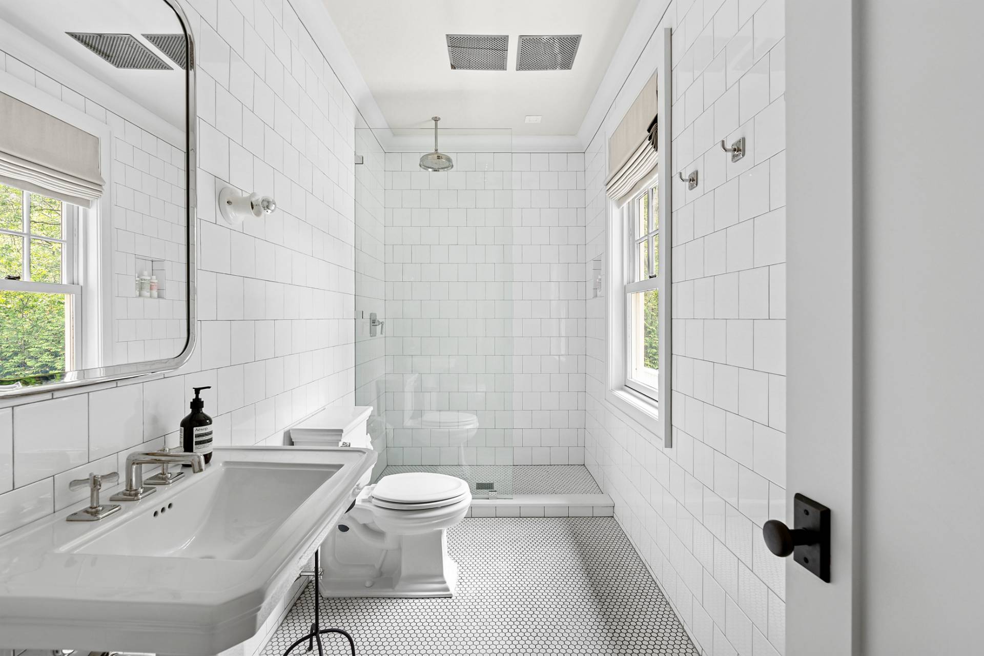 23 Wooded Path Sag Harbor, NY 11963 - Photo 15 of 25 a bathroom with a sink toilet and shower