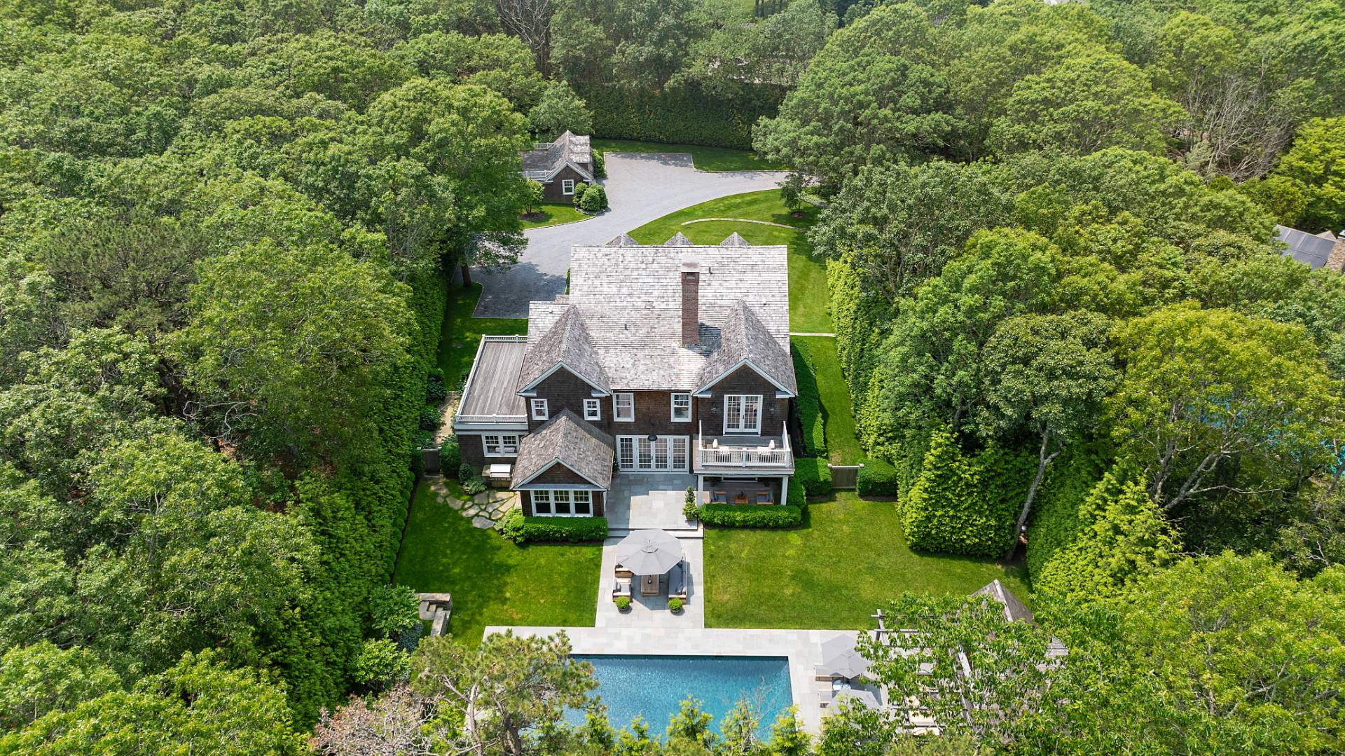 23 Wooded Path Sag Harbor, NY 11963 - Photo 24 of 25 an aerial view of a house with a garden and trees