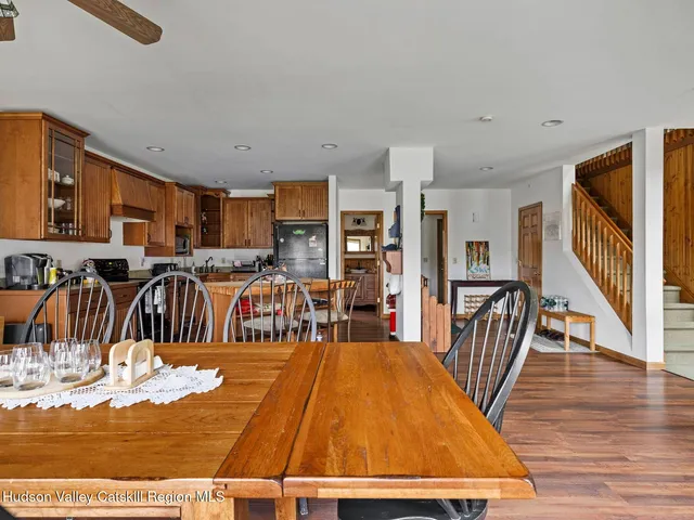 a view of a livingroom with furniture and window