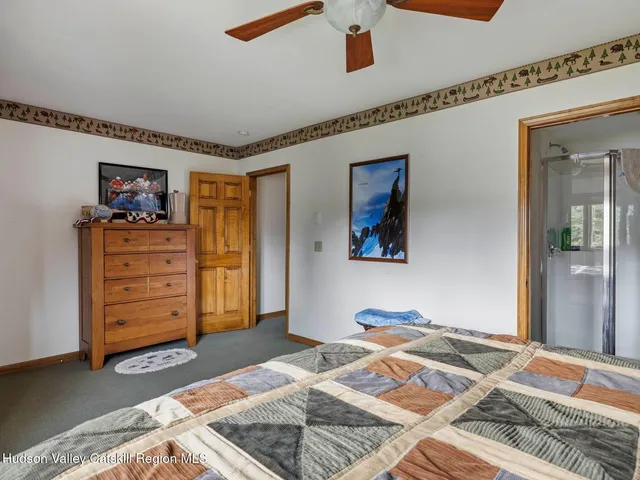 a view of play room with toys and a garage