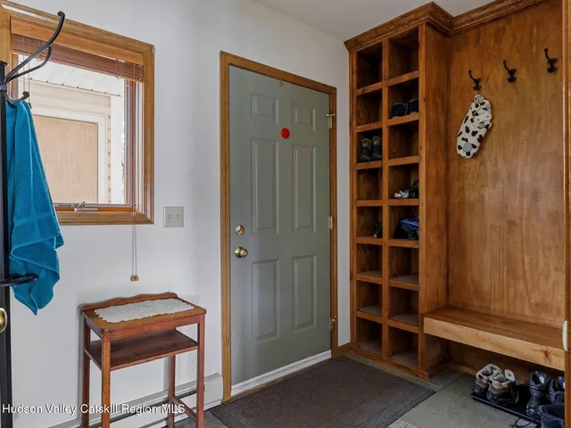 a room that has a dresser and a window