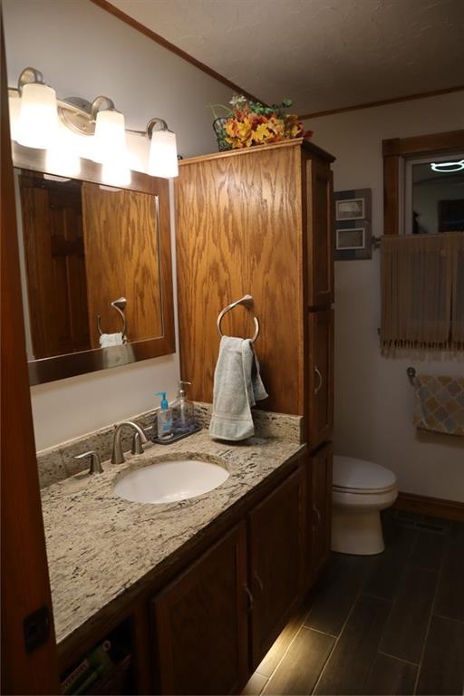 271 Medical Center Road Chicora, PA 16025 - Photo 11 of 18 a bathroom with a granite countertop sink toilet and shower