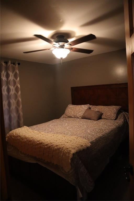 271 Medical Center Road Chicora, PA 16025 - Photo 13 of 18 a bedroom with a bed and a mirror