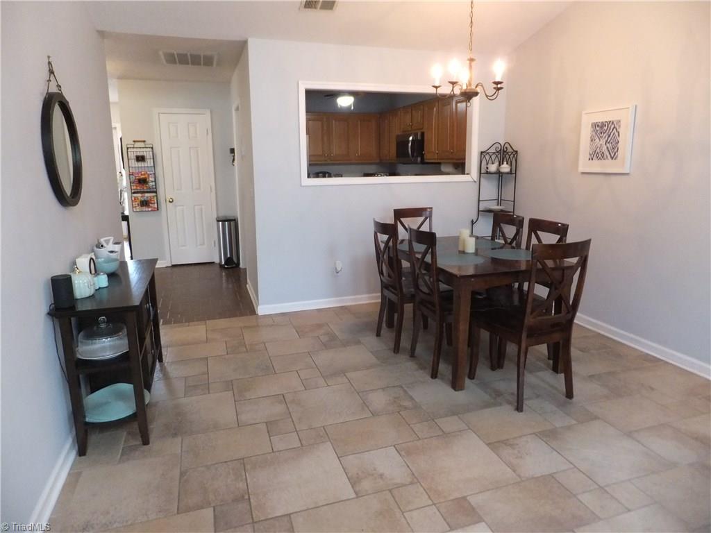 4420 Single Tree Lane High Point, NC 27265 - Photo 8 of 17 Dining area with kitchen pass through