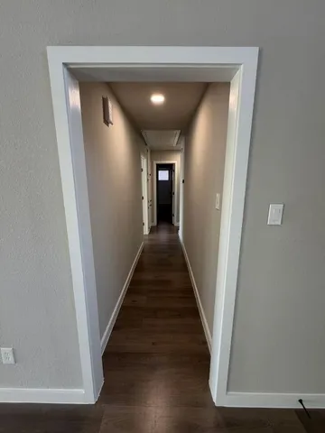 a view of an empty room and window