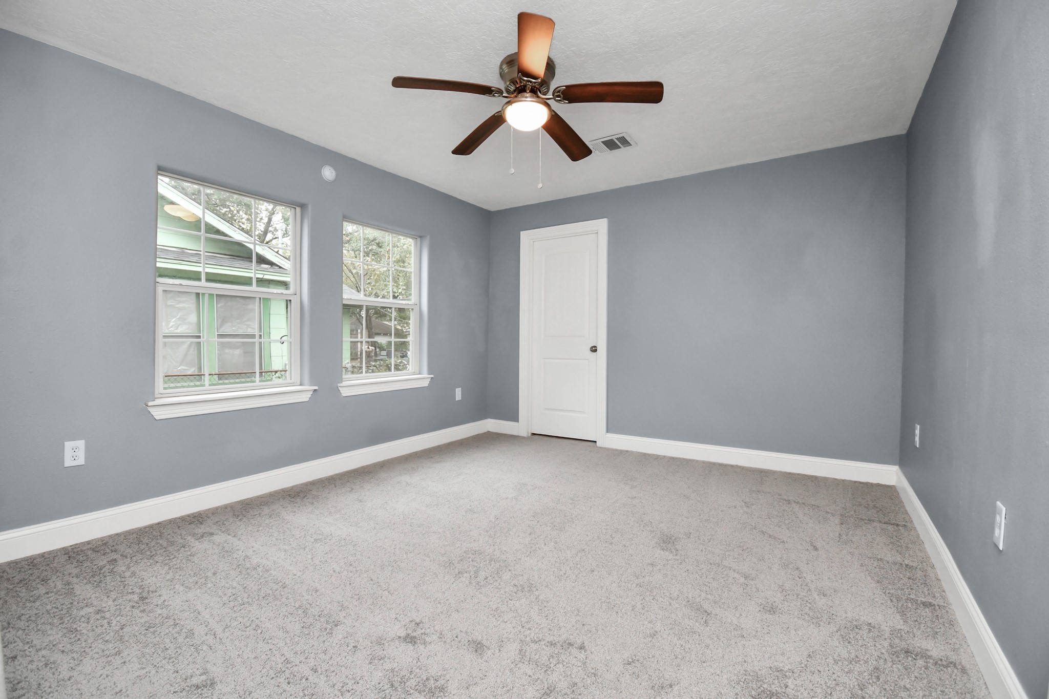 3217 Michigan Street Baytown, TX 77520 - Photo 19 of 37 a view of an empty room with a window