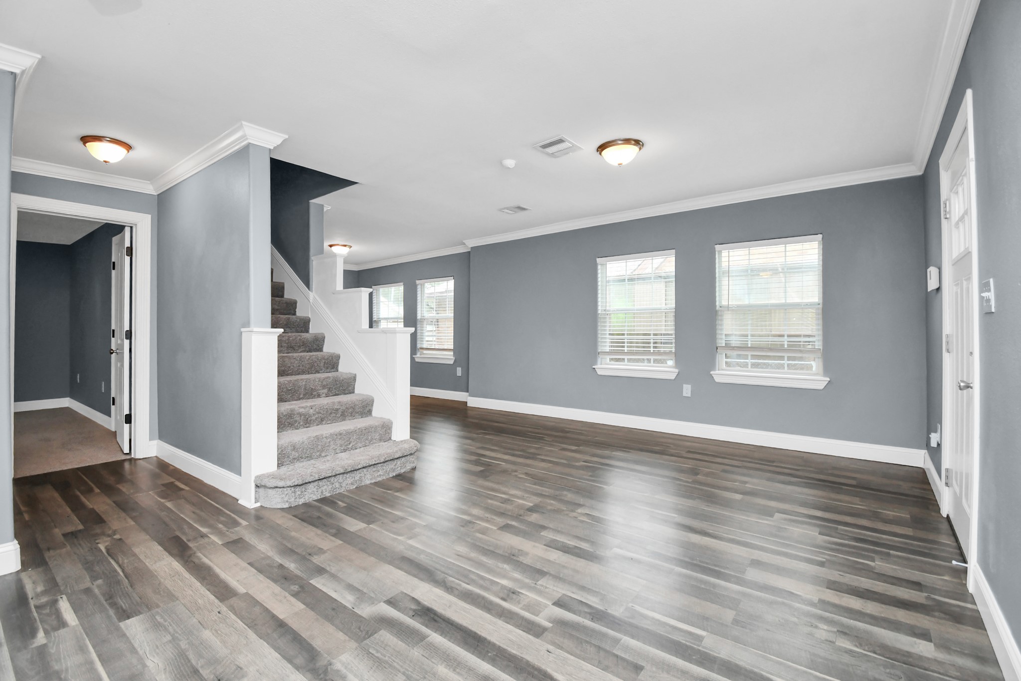 3217 Michigan Street Baytown, TX 77520 - Photo 5 of 37 a view of entryway and hall with wooden floor