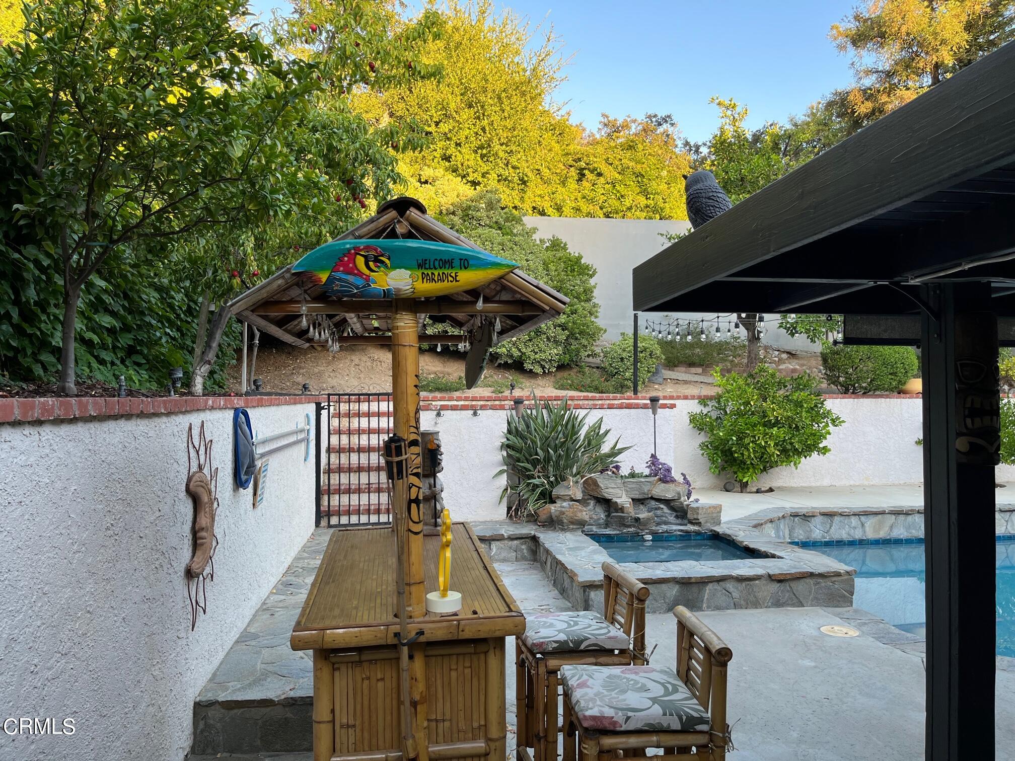 25049 Highspring Avenue Newhall, CA 91321 - Photo 33 of 52 a view of outdoor space yard deck patio and outdoor kitchen