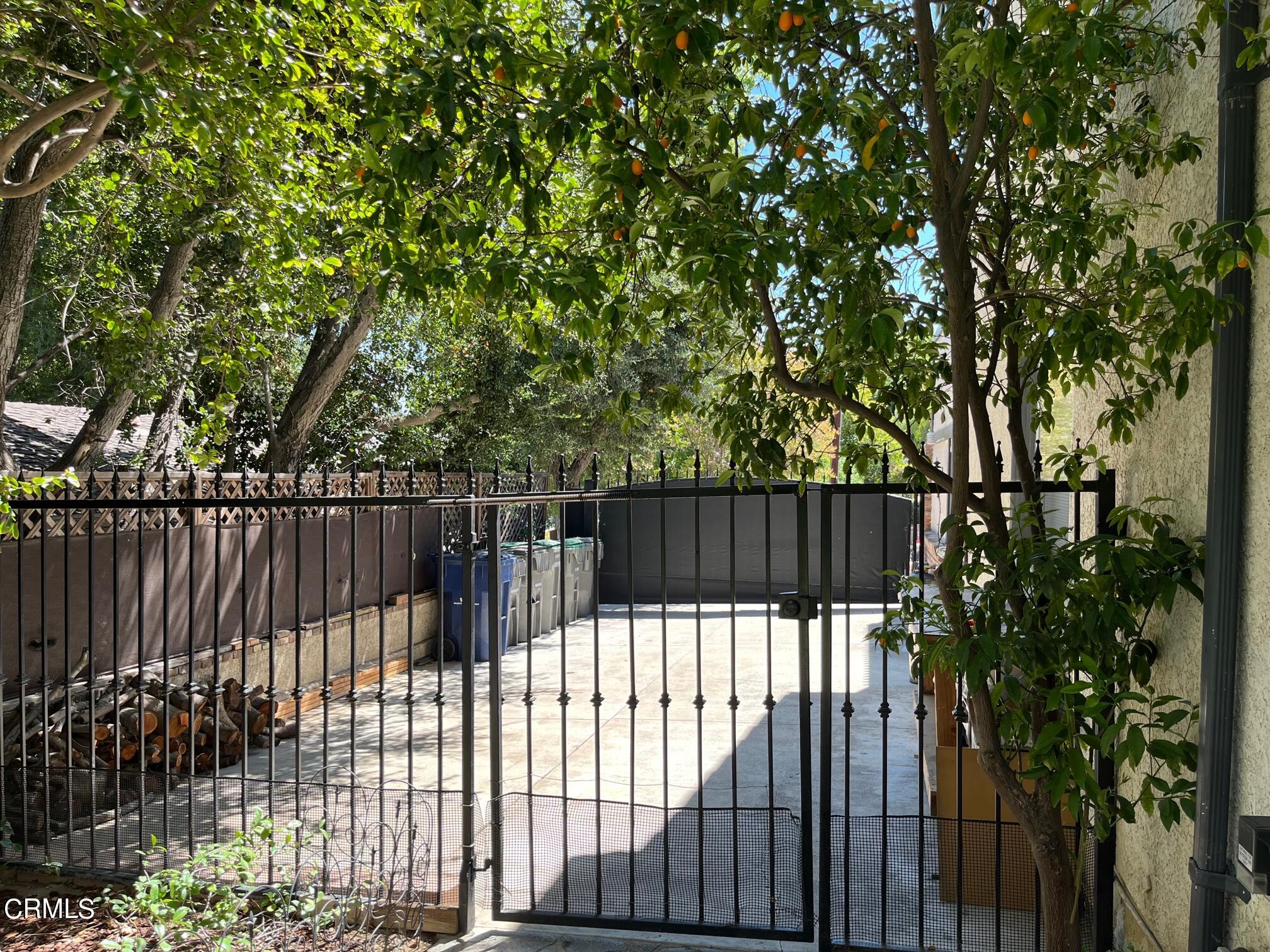 25049 Highspring Avenue Newhall, CA 91321 - Photo 48 of 52 a view of a wrought iron fences in front of house