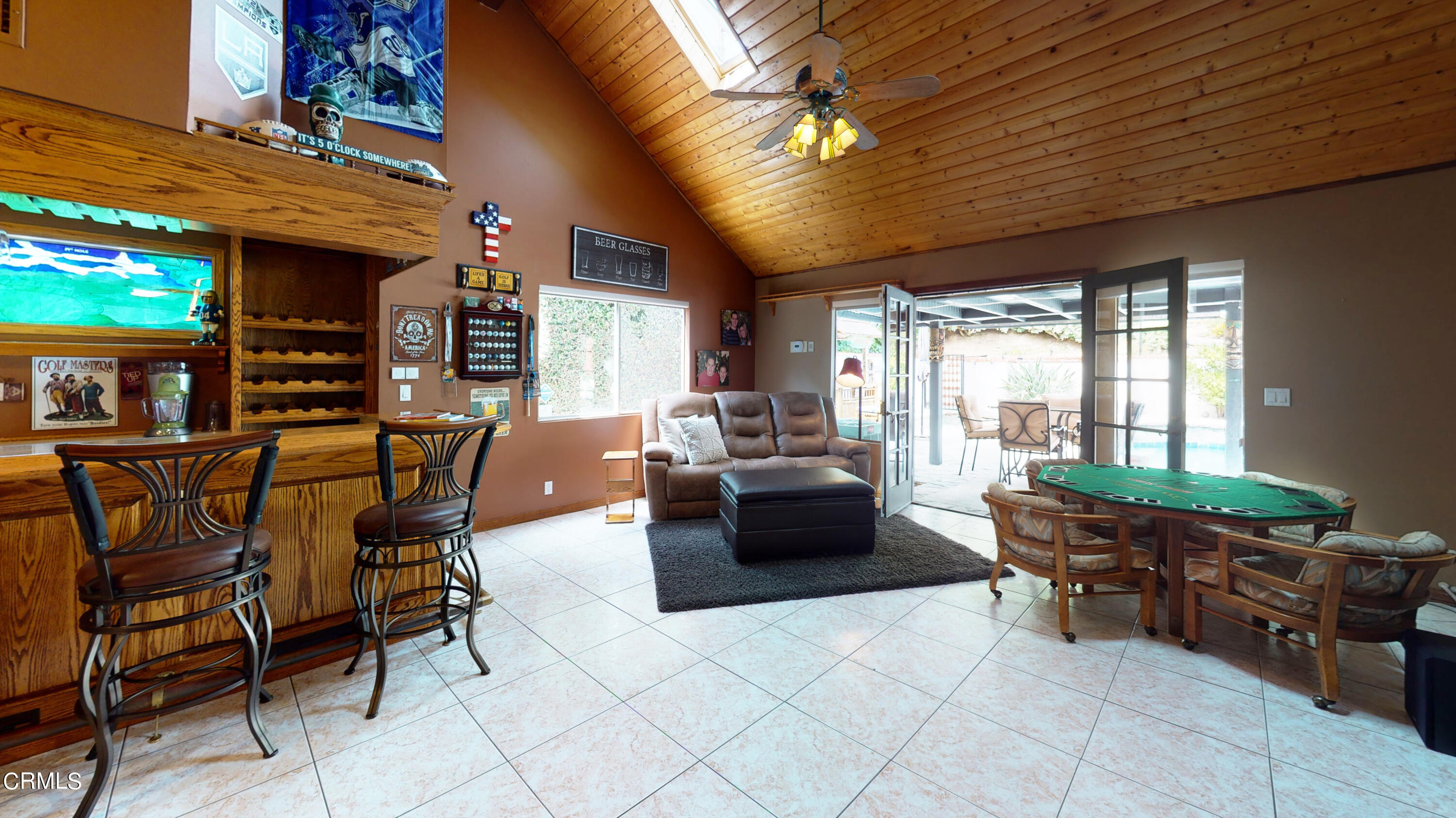 25049 Highspring Avenue Newhall, CA 91321 - Photo 10 of 52 a living room with furniture and a flat screen tv