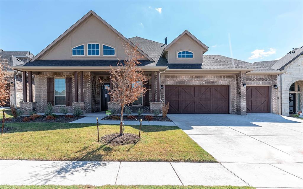 1907 Rondinella Drive Rockwall, TX 75032 - Photo 1 of 21 a front view of a house with a yard
