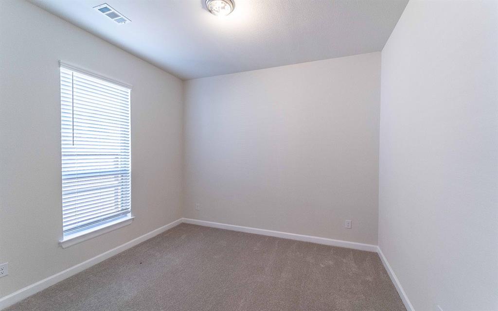 1907 Rondinella Drive Rockwall, TX 75032 - Photo 16 of 21 an empty room with a window