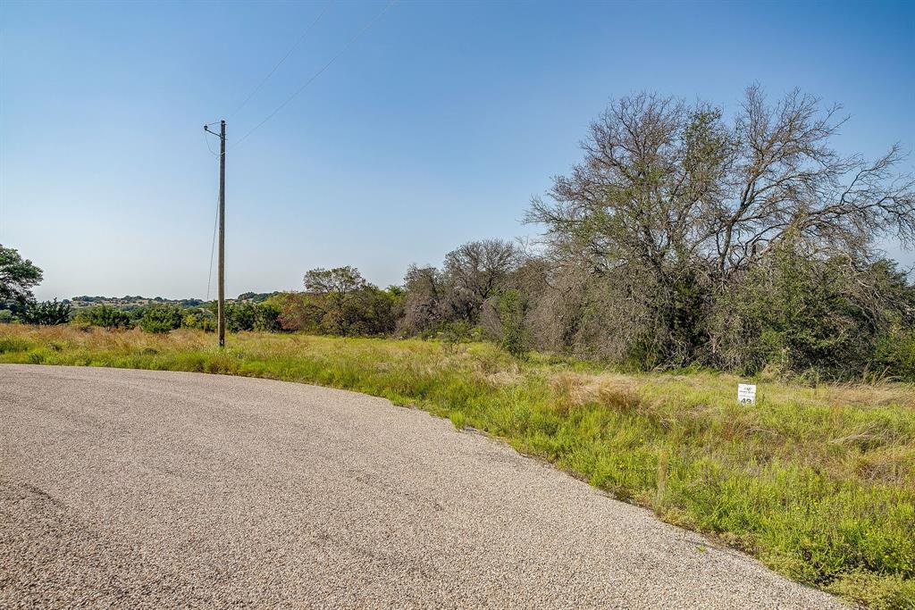 1034 Hidden View Glen Rose, TX 76043 - Photo 12 of 15 a view of a backyard
